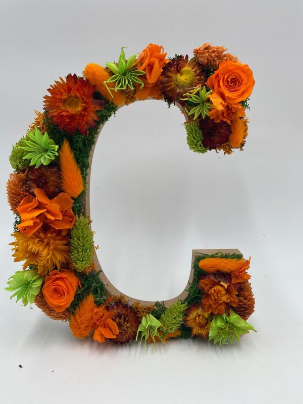 Lletres en flor preservada
